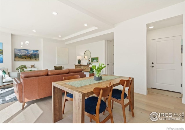 dining room with light hardwood / wood-style flooring