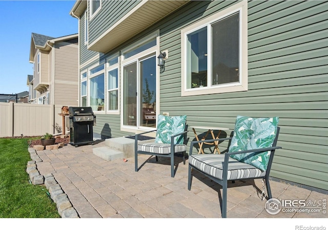 view of patio with a grill