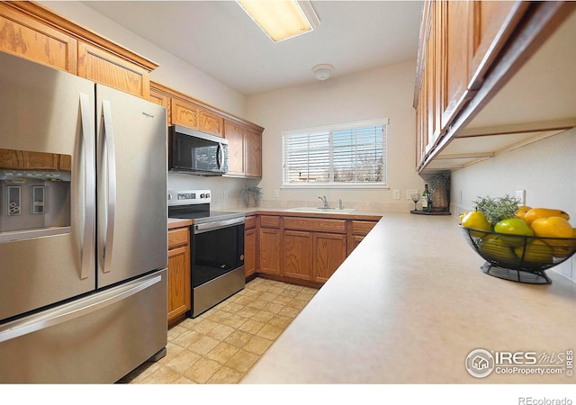 kitchen with stainless steel appliances and sink