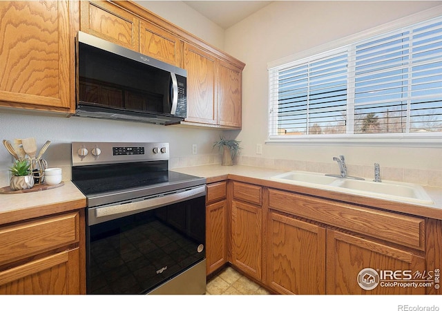 kitchen with stainless steel appliances and sink