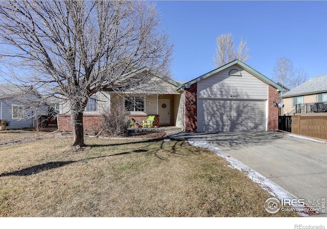 ranch-style house with a garage and a front lawn