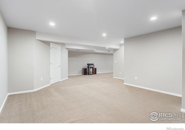 basement with light colored carpet