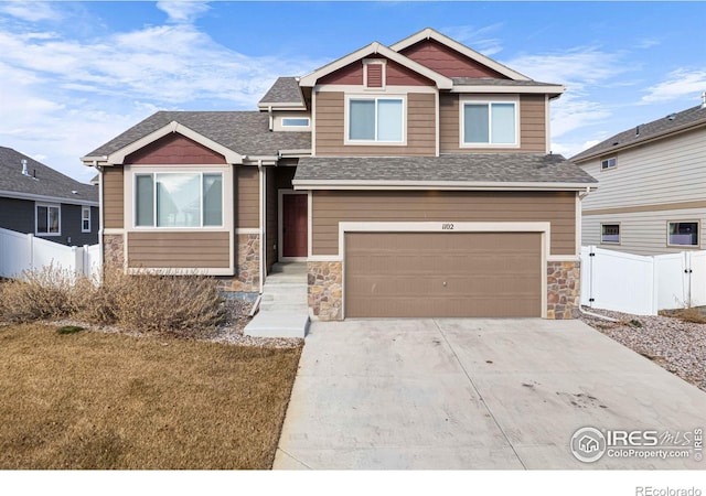 craftsman inspired home featuring a garage