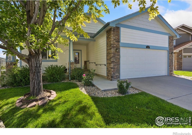 view of front facade with a front yard and a garage