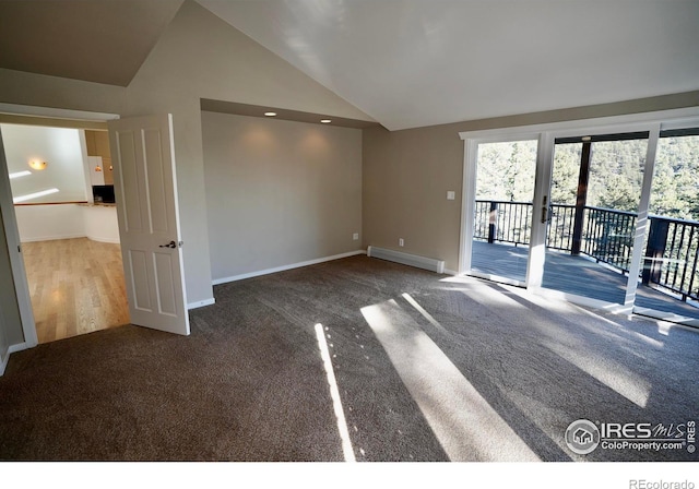 unfurnished living room with high vaulted ceiling, carpet flooring, and baseboard heating