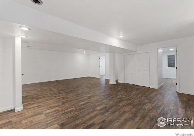 basement featuring dark wood-type flooring