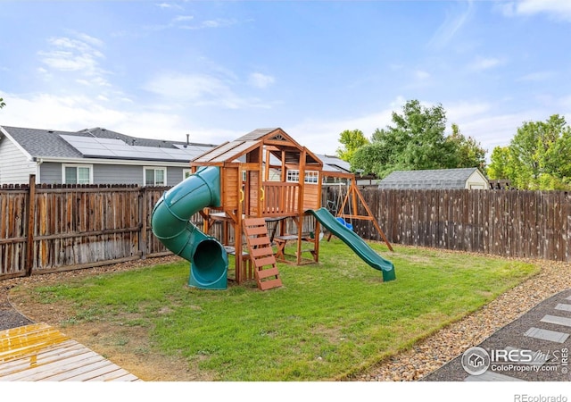 view of jungle gym featuring a yard