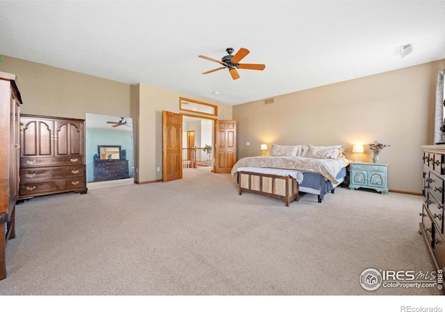 bedroom featuring ceiling fan and light colored carpet