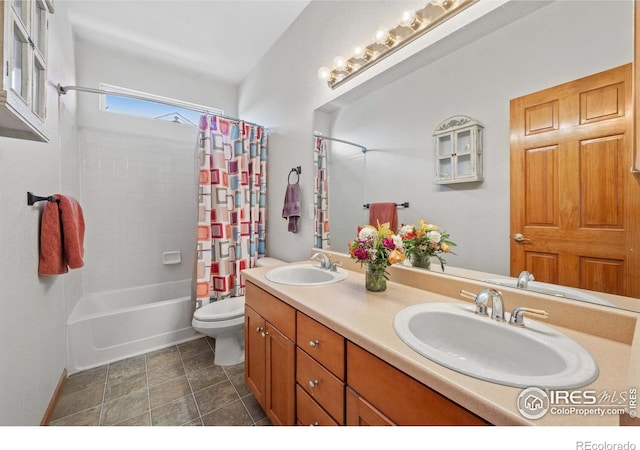 full bathroom with toilet, shower / tub combo, and vanity