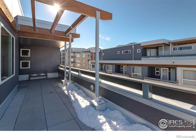 view of patio / terrace with a balcony