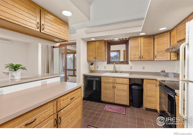 kitchen with sink and black appliances