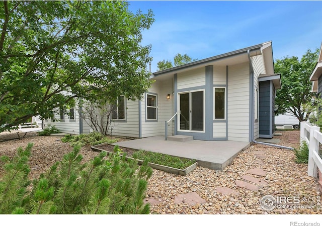 rear view of house with a patio area