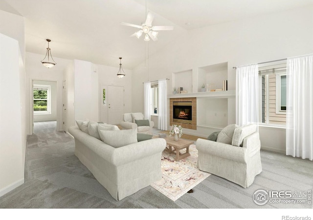 living room featuring carpet, ceiling fan, a fireplace, built in features, and high vaulted ceiling