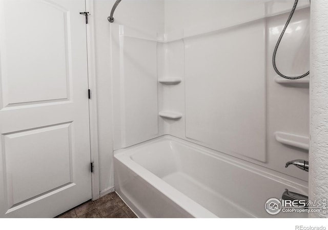 bathroom featuring tile patterned floors and shower / tub combination