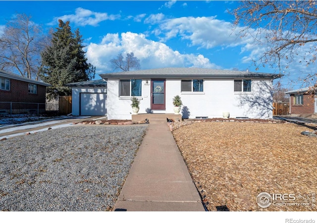 single story home with a garage