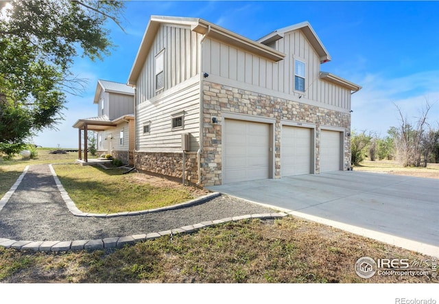 view of side of property featuring a garage