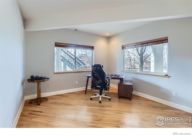 office area featuring a healthy amount of sunlight and light hardwood / wood-style floors