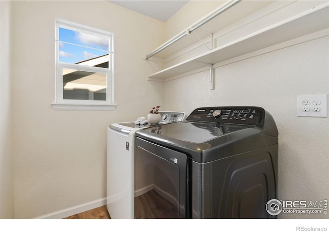 washroom featuring washer and dryer and hardwood / wood-style floors