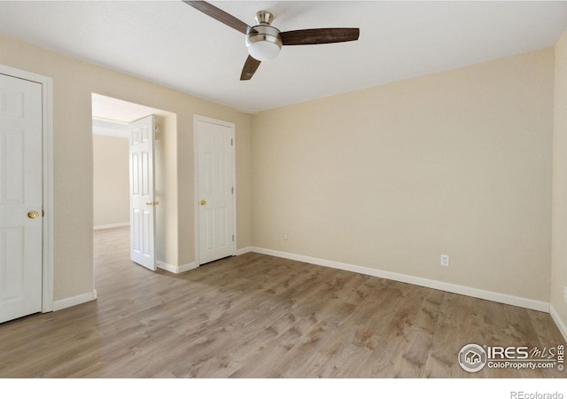 unfurnished bedroom with light wood-type flooring and ceiling fan