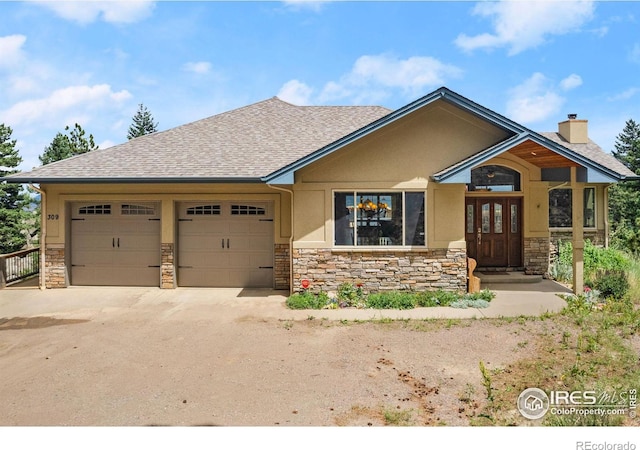 view of front of home with a garage