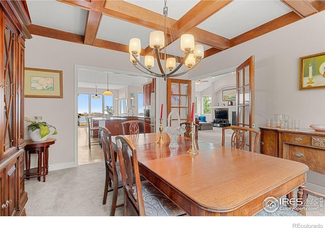 carpeted dining room featuring a wealth of natural light, beam ceiling, a notable chandelier, and coffered ceiling