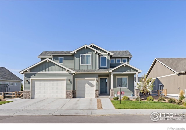 craftsman-style home featuring a garage