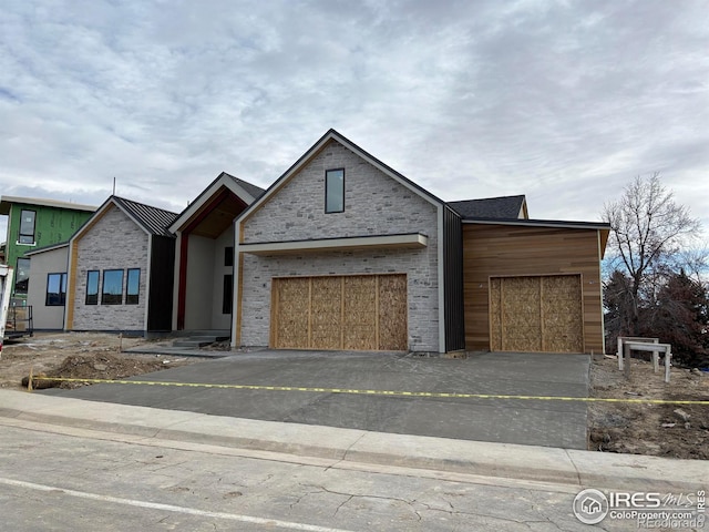 view of front of property with a garage