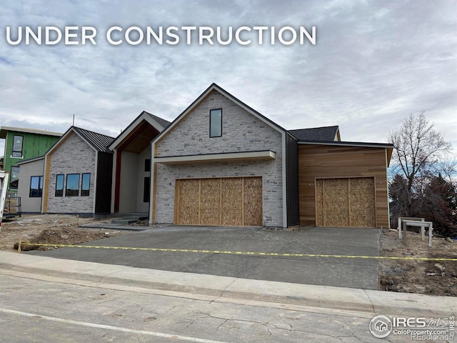 view of front of home with a garage