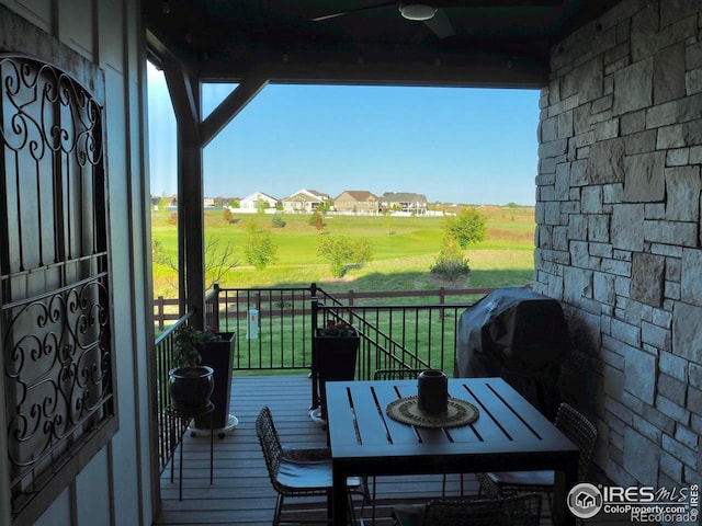4260 Grand Park Dr, Timnath, CO 80547 - wooden deck featuring area for grilling and a lawn