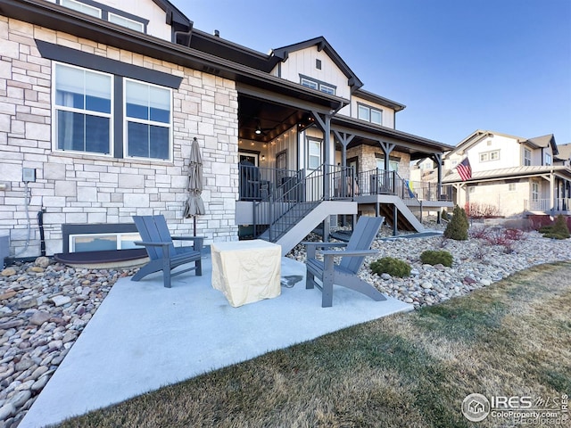 4260 Grand Park Dr, Timnath, CO 80547 - view of patio / terrace featuring stairway
