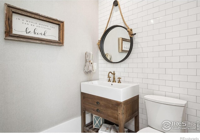 half bath with vanity and toilet