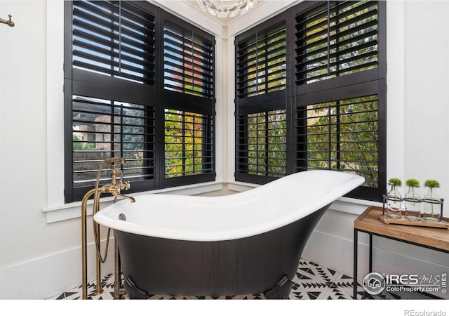 full bathroom with a soaking tub