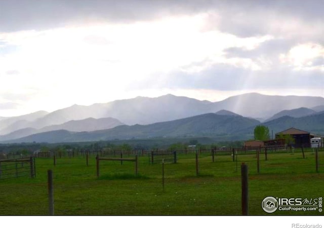 view of mountain feature featuring a rural view