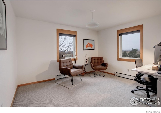 carpeted home office featuring baseboard heating