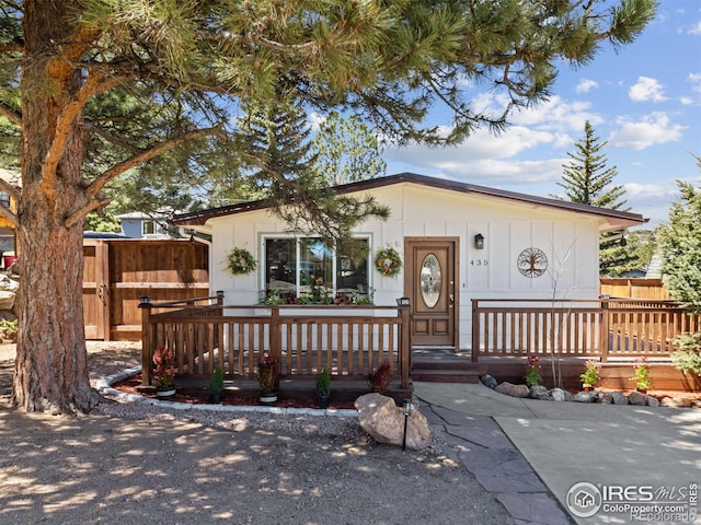 view of front of house featuring a deck