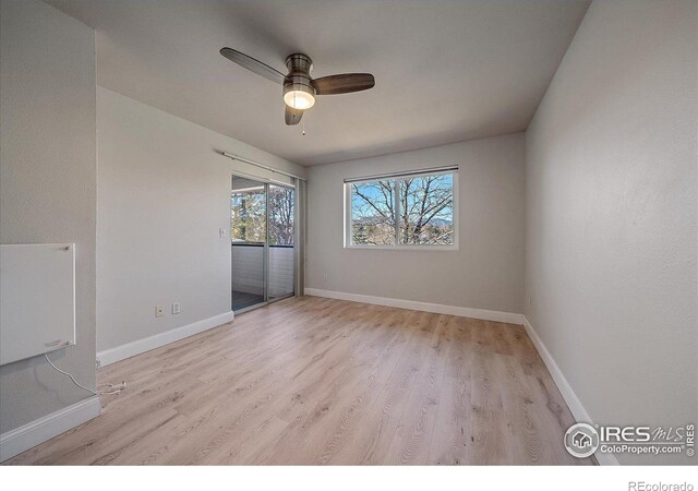 770 Copper Ln Unit 206, Louisville, CO 80027 - unfurnished room featuring ceiling fan and light hardwood / wood-style flooring