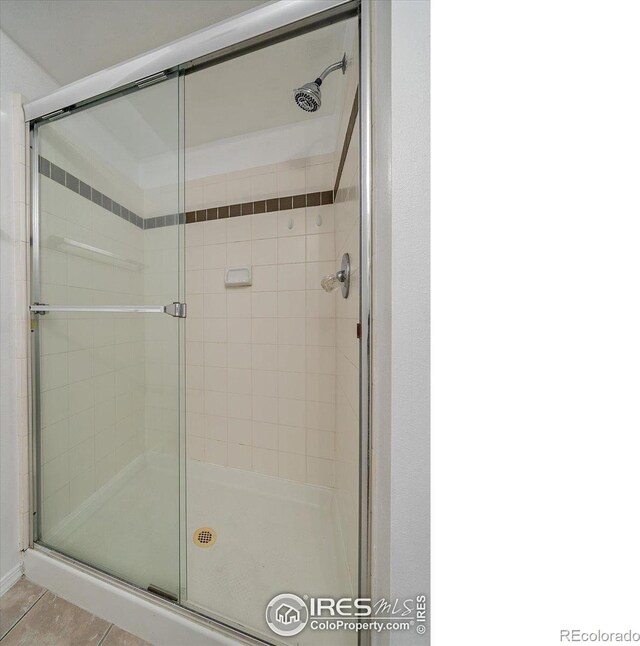 770 Copper Ln Unit 206, Louisville, CO 80027 - bathroom with a shower with door and tile patterned flooring