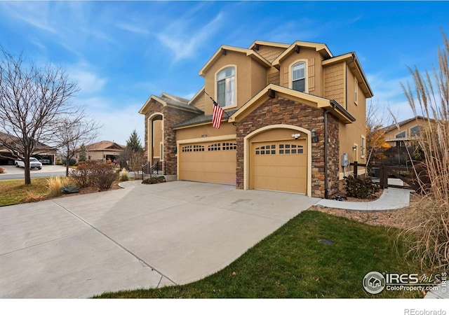 front of property featuring a garage