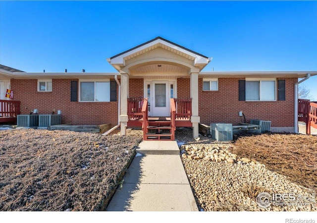 view of front of home featuring central air condition unit