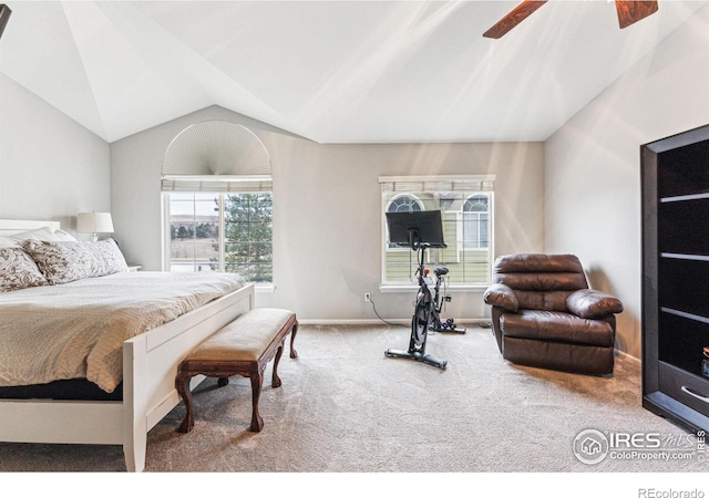 carpeted bedroom featuring vaulted ceiling and ceiling fan