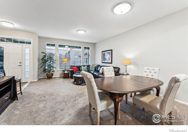 view of carpeted dining room