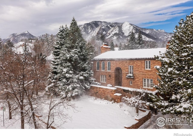 exterior space featuring a mountain view