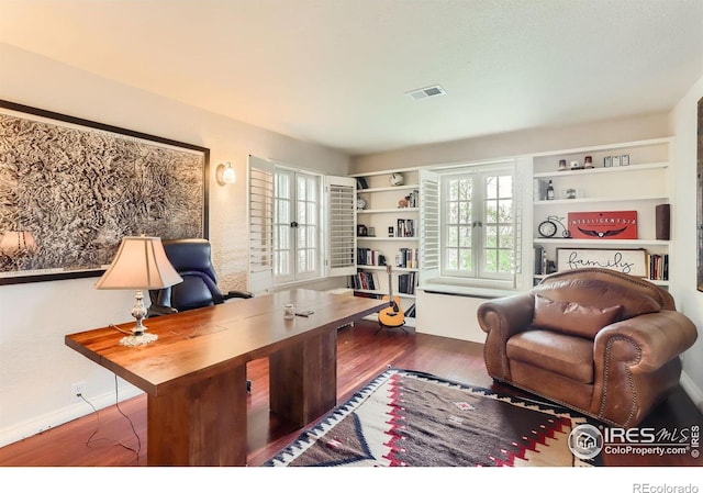 office area featuring wood-type flooring and french doors