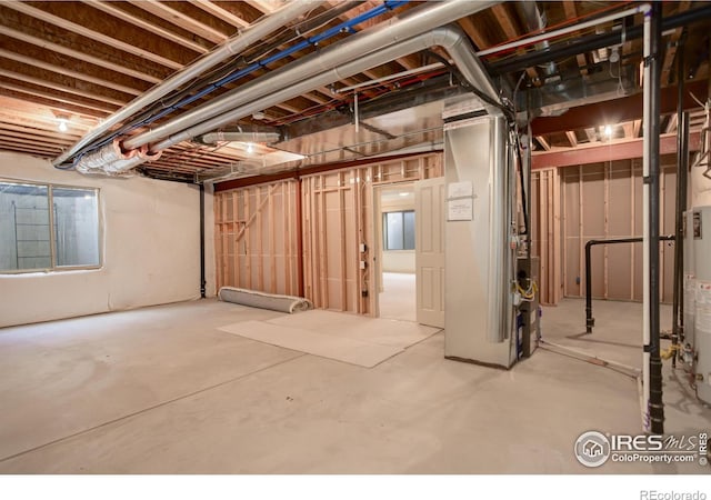 basement featuring gas water heater