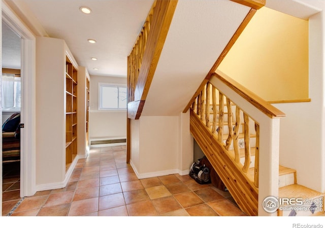 hallway with light tile patterned flooring