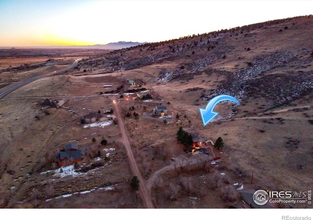 view of aerial view at dusk