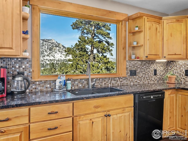 kitchen featuring light brown cabinetry, sink, a mountain view, black dishwasher, and dark stone countertops