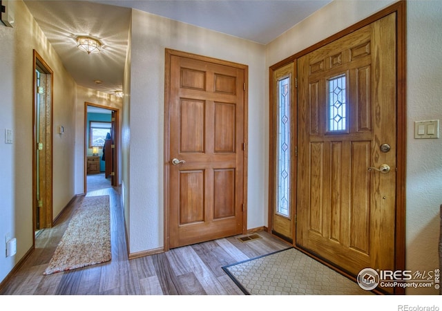 foyer featuring light hardwood / wood-style flooring