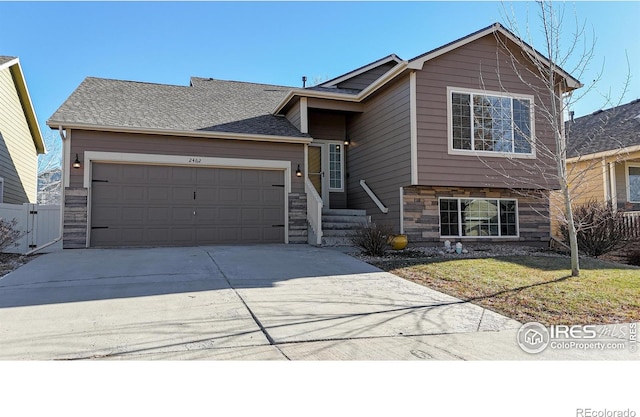 view of front of property with a garage