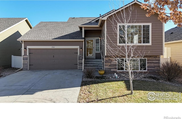 view of front of home with a garage